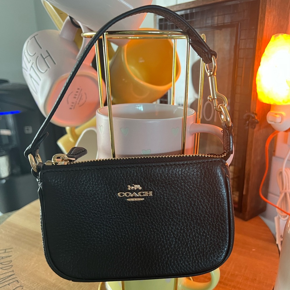 Black mini Nolita bag.